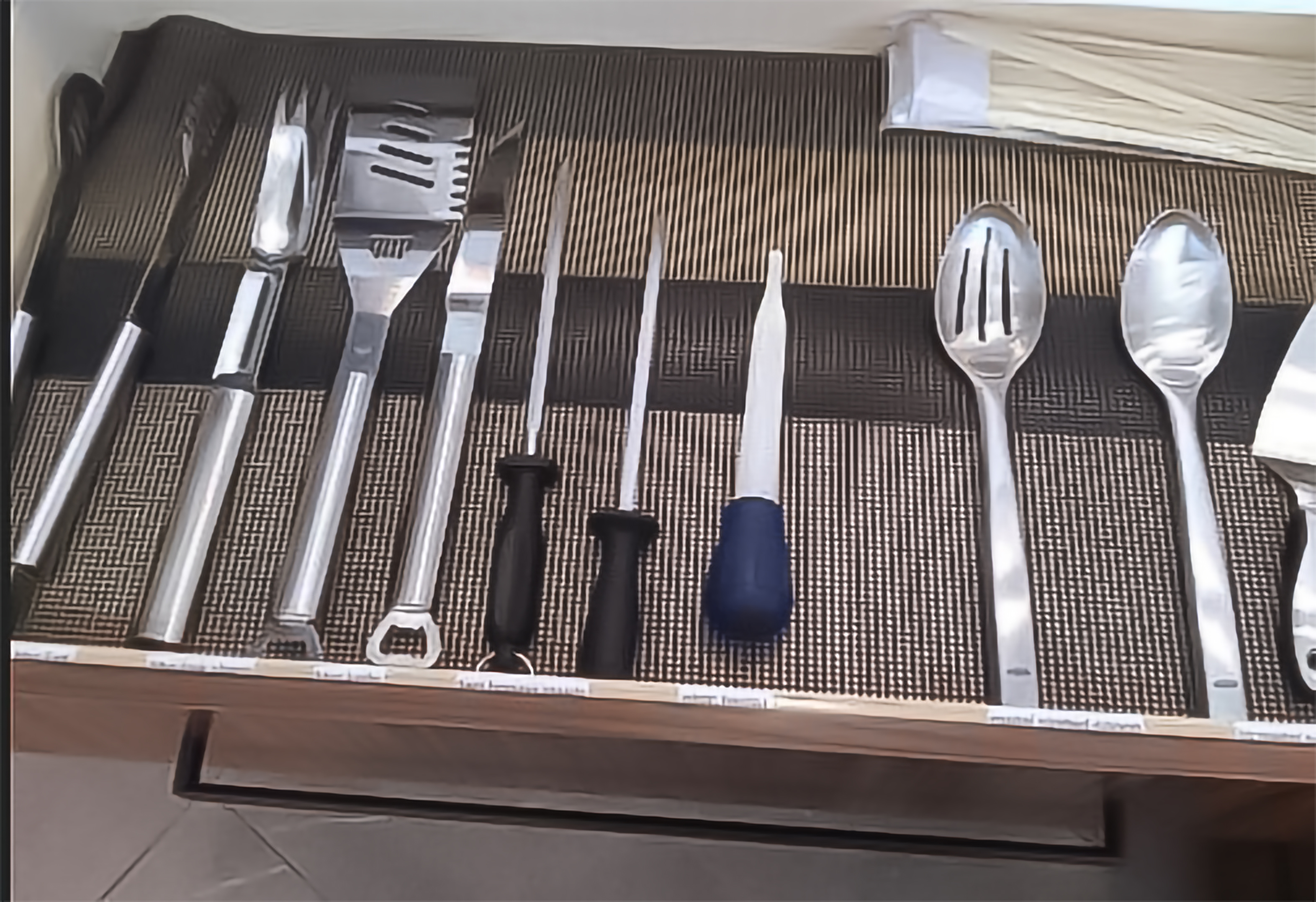 Perfectly organized utensil drawer — vacation rental cleaning